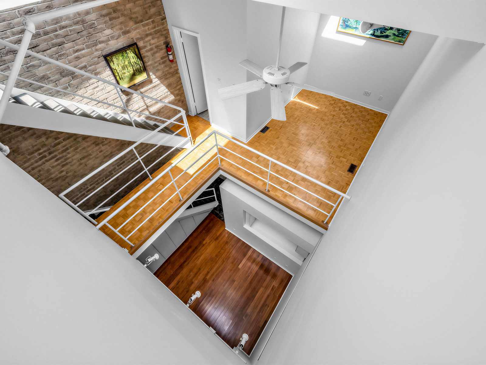 Soaring 30-foot atrium flooding the space with dramatic natural light